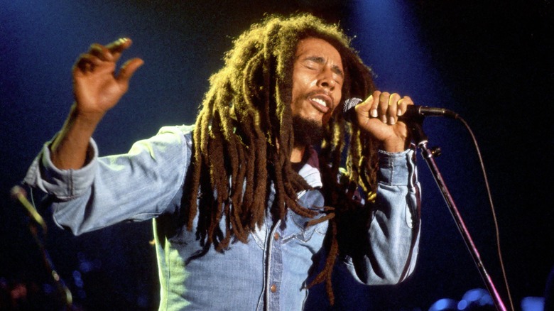 Bob Marley singing into microphone