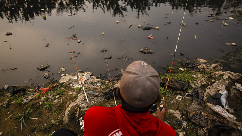 fishing in the polluted Citarum River