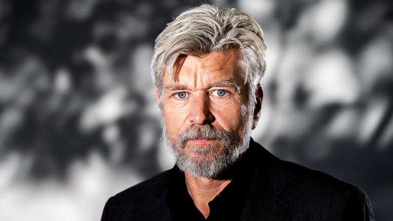 Karl Ove Knausgaard in dark suit