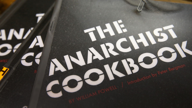 Copies of The Anarchist Cookbook cover