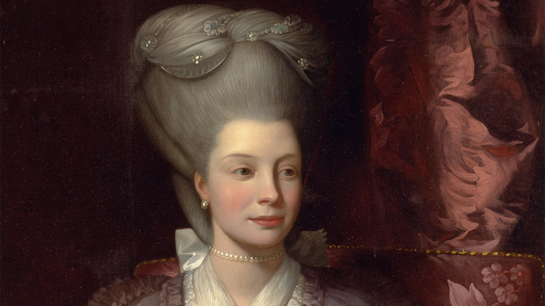 Queen Charlotte looks right and frowns