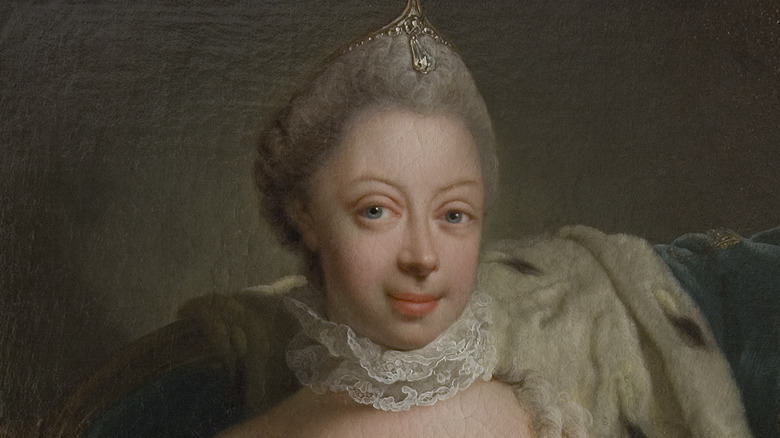 Queen Charlotte smiles in a portrait