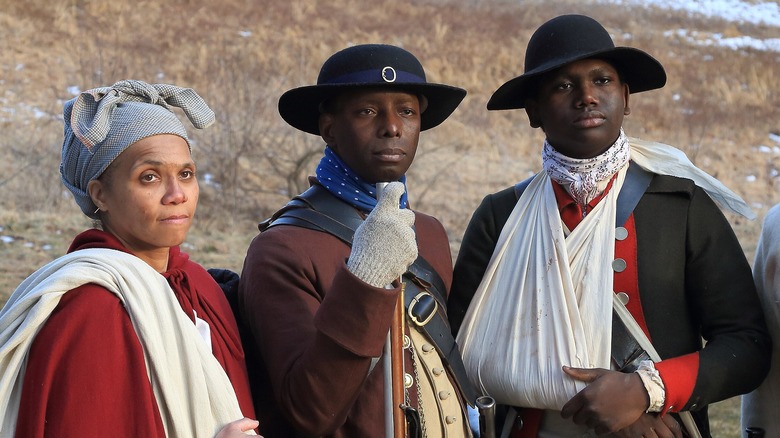 Three Black reenactors at Valley Forge National Historical Park