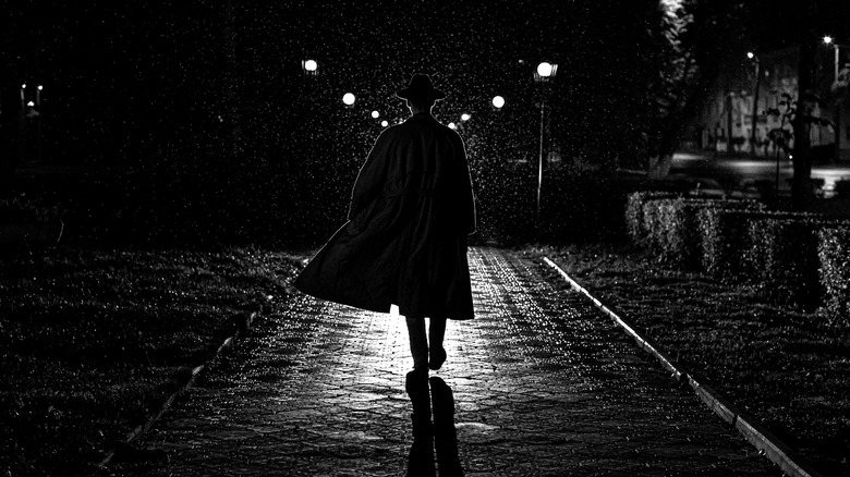 A man walking in trench coat