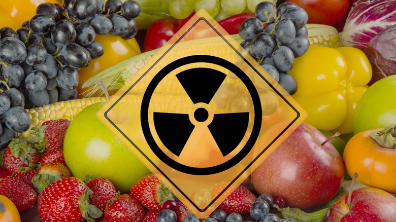fruit and vegetables with a radioactive symbol in front