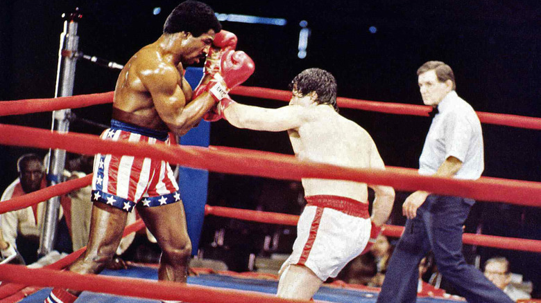 Apollo Creed defending against Rocky Balboa