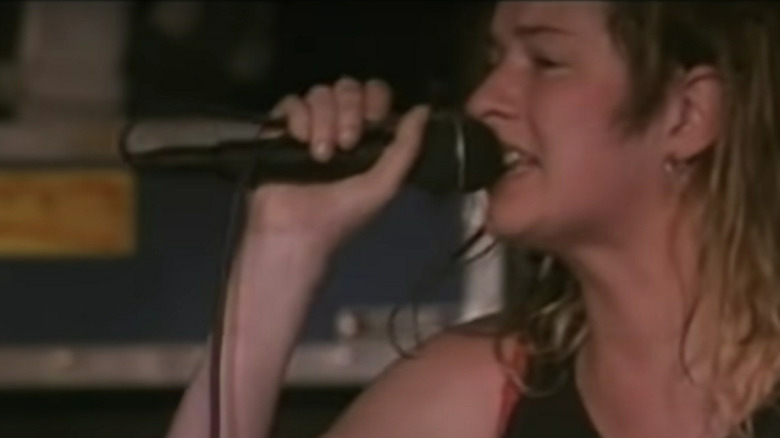 Mia Zapata performs on stage