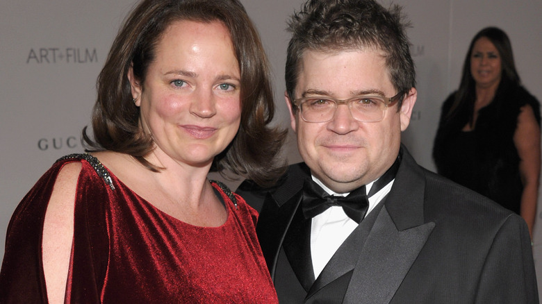 Patton Oswalt and Michelle McNamara smiling at event