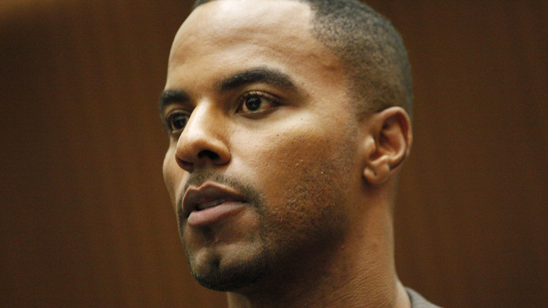 Darren Sharper looking serious courtroom