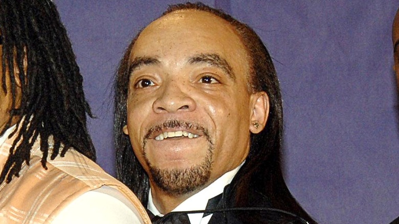 Kidd Creole smiling teeth