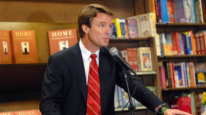 John Edwards speaking podium microphone books