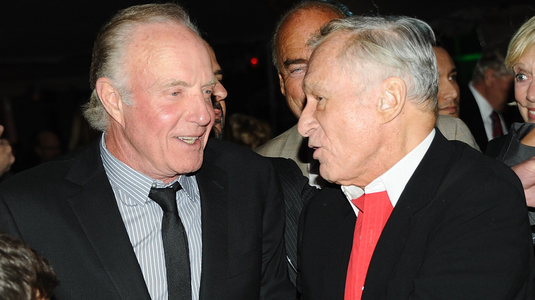 James Caan and Hugh Hefner talking