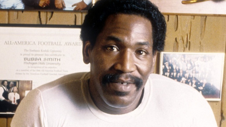 Bubba Smith with football awards