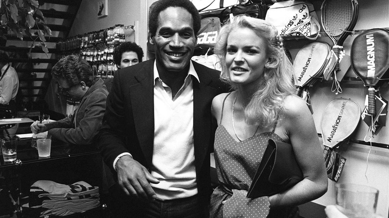 Nicole Brown Simpson and O.J. Simpson smiling