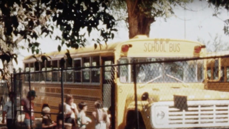 Chowchilla summer school students boarding a school bus