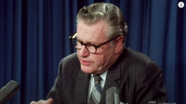 Governor Nelson Rockefeller looking down