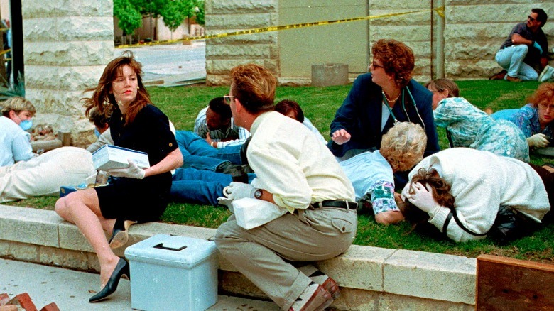 Bystanders sheltering after bombing