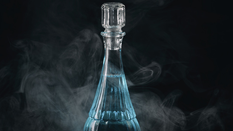 Glass bottle blue liquid smoke