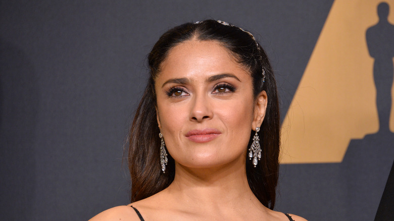 salma hayek at event diamond earrings