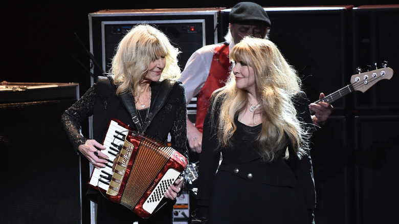 Christine McVie and Stevie Nicks performing