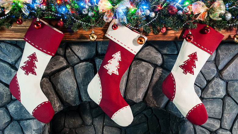 Christmas stockings hung on the mantle