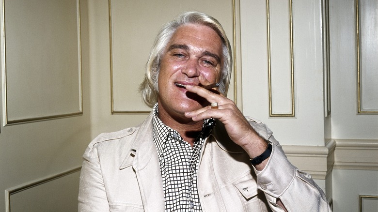 Charlie Rich smoking a cigar