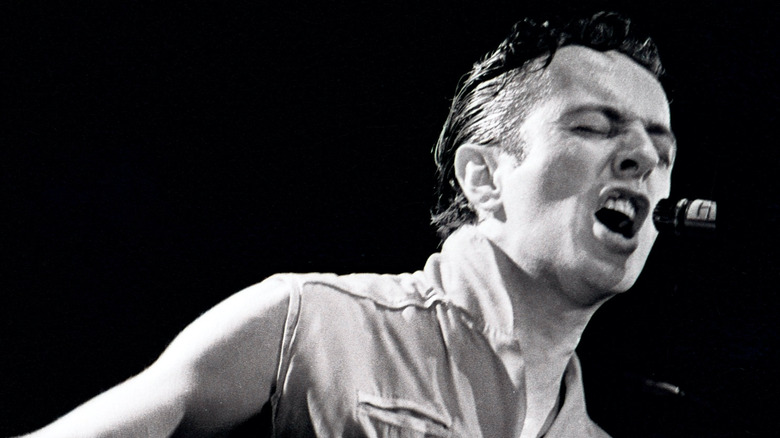 Joe Strummer of The Clash performing onstage