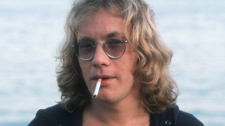 Warren Zevon smoking a cigarette in 1970