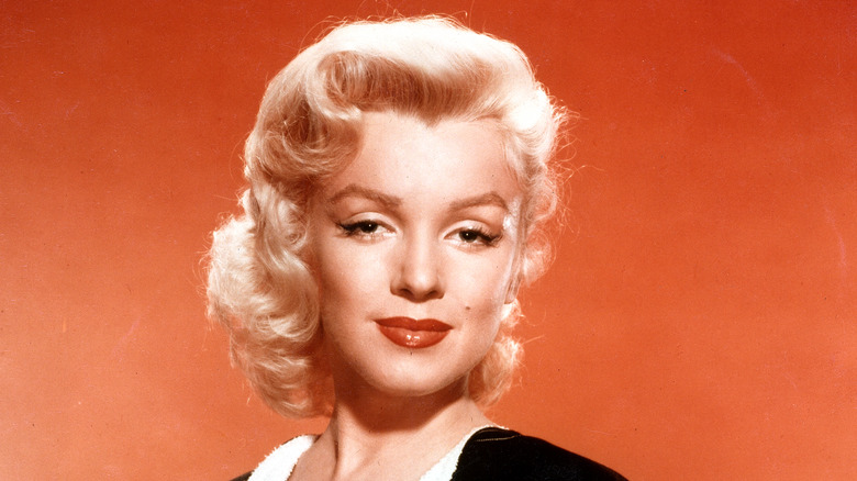 Marilyn Monroe black shirt lipstick
