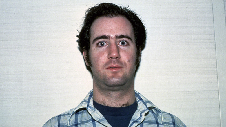 Andy Kaufman checkered shirt neutral white background