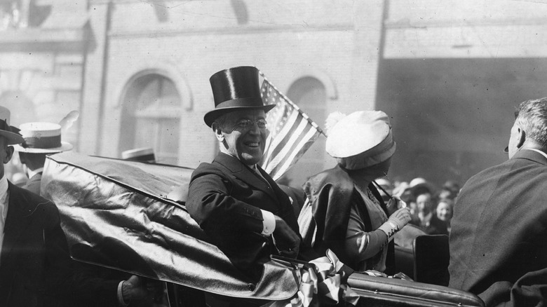 Woodrow Wilson in carriage with first lady tophat