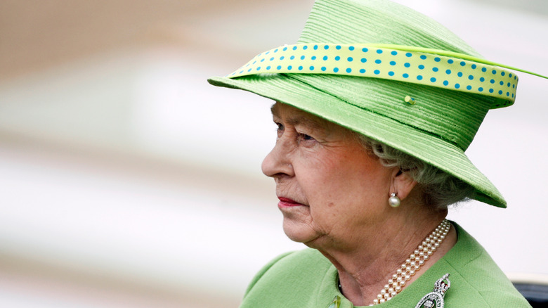 Queen Elizabeth II in green outfit