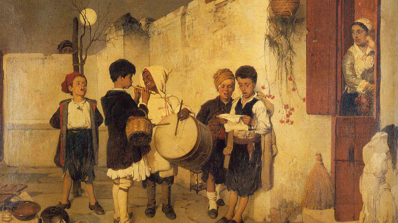 A group of carolers with instruments