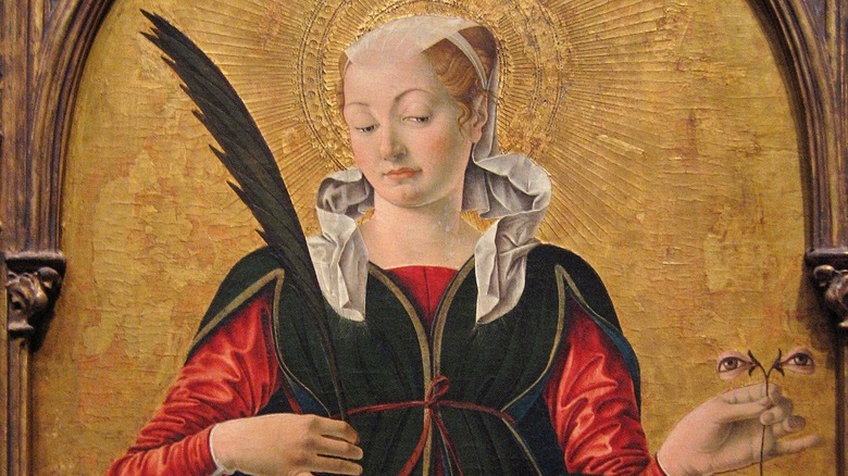 Saint Lucy holding her eyes and martyr's palm