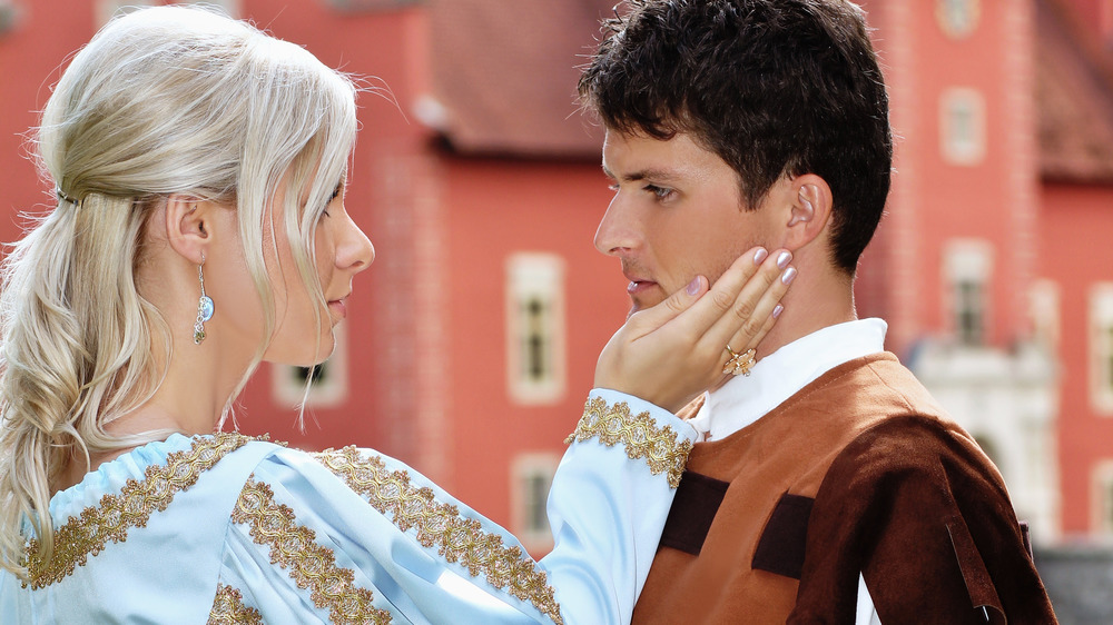 medieval man and woman looking at each other