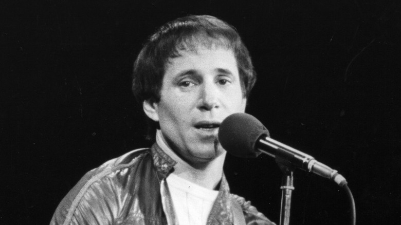 Paul Simon playing music