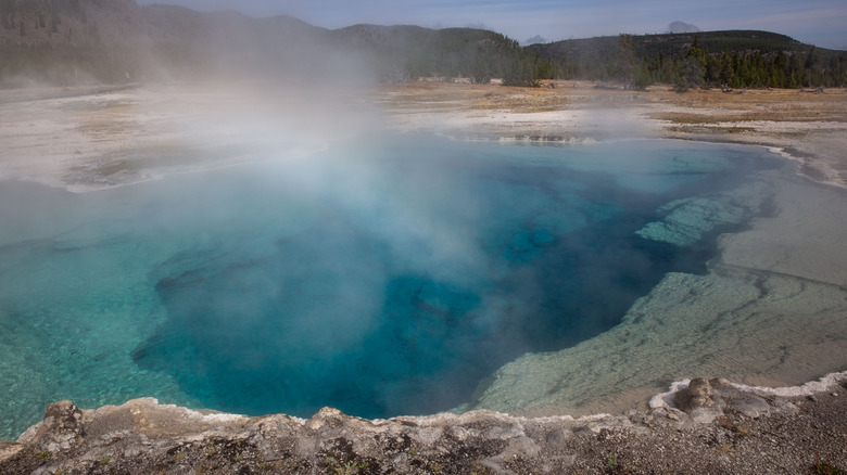 Hot spring blue water steam