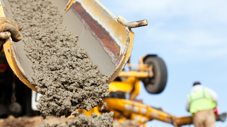 Workers pouring cement