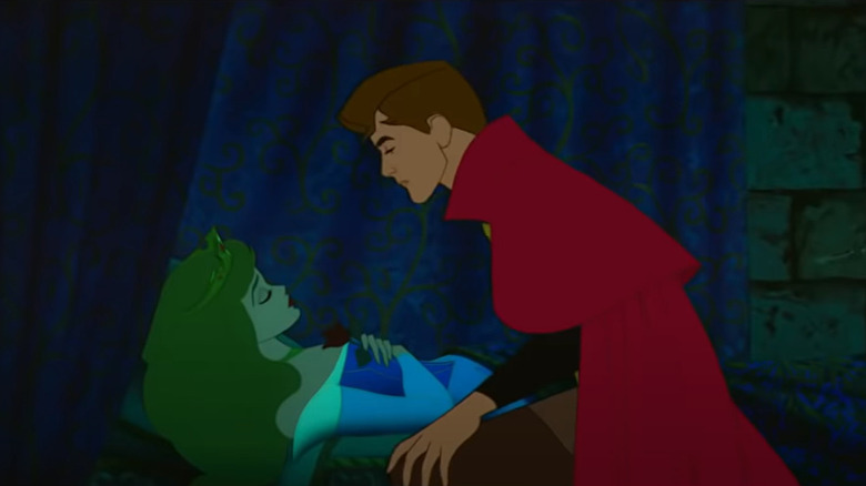 Prince Phillip leaning in to kiss Princess Aurora