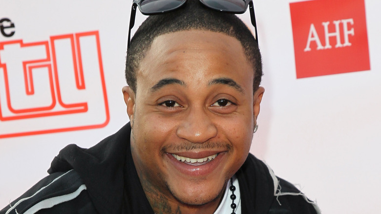 orlando brown smiling sunglasses on head