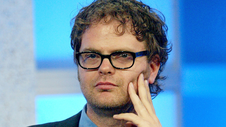 rainn wilson glasses hand on face