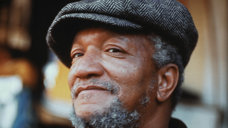 Redd Foxx as Fred Sanford smiling hat