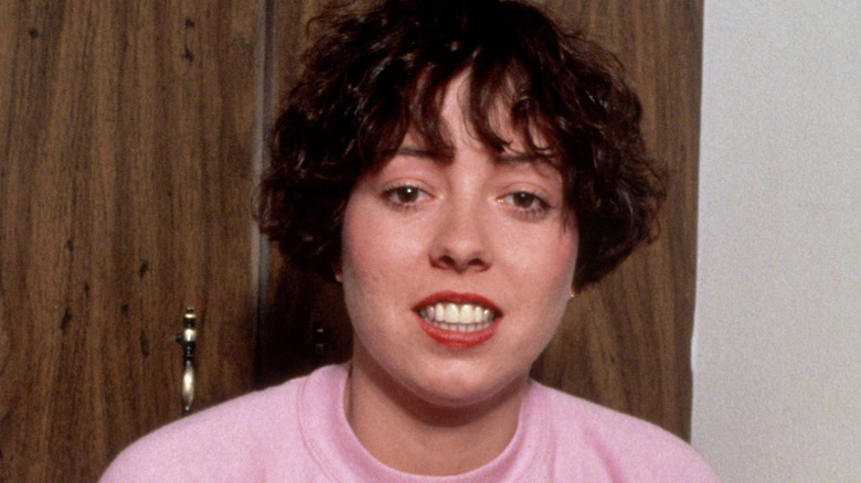 Mackenzie Phillips in 1980s wooden door