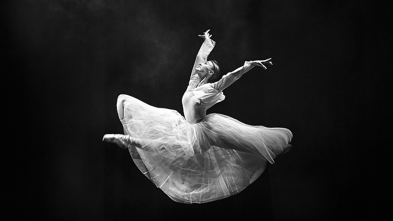 a dancer in the middle of a jump