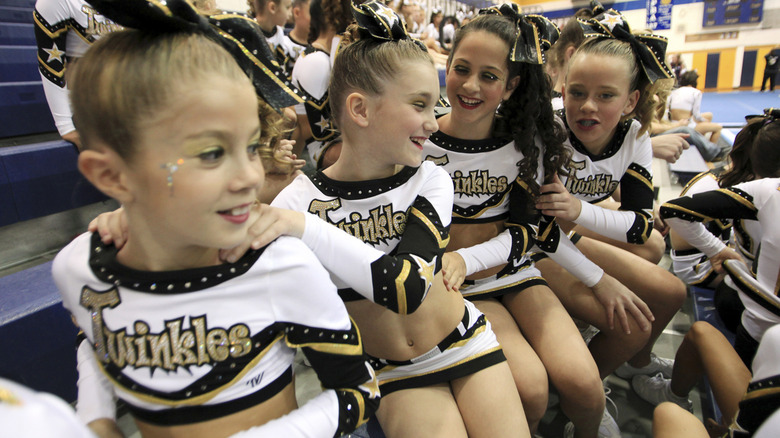 Young cheerleaders wait to compete