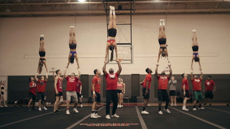 Navarro cheerleaders practice holds