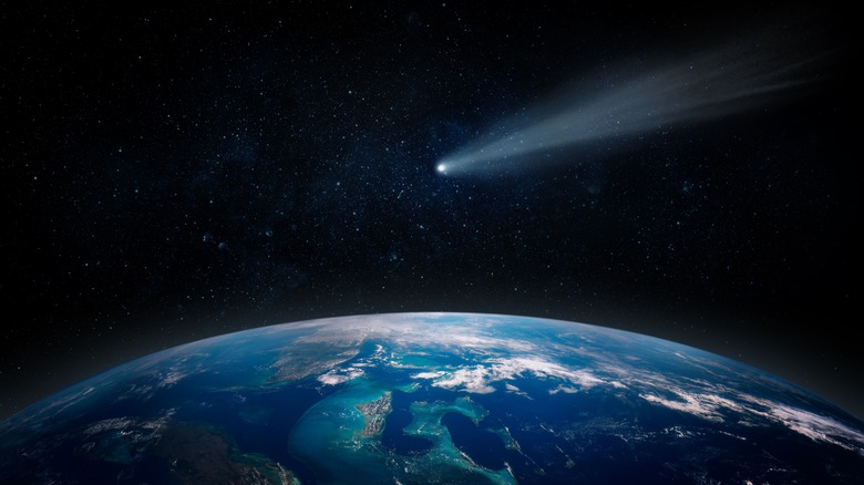 comet flying above Earth