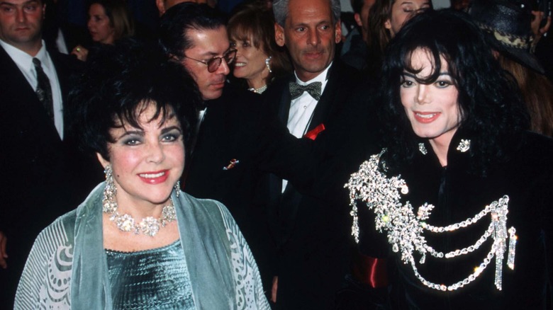 Elizabeth Taylor with Michael Jackson smiling