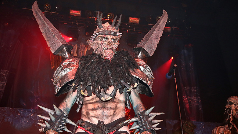 Dave Brockie performing live monster suit