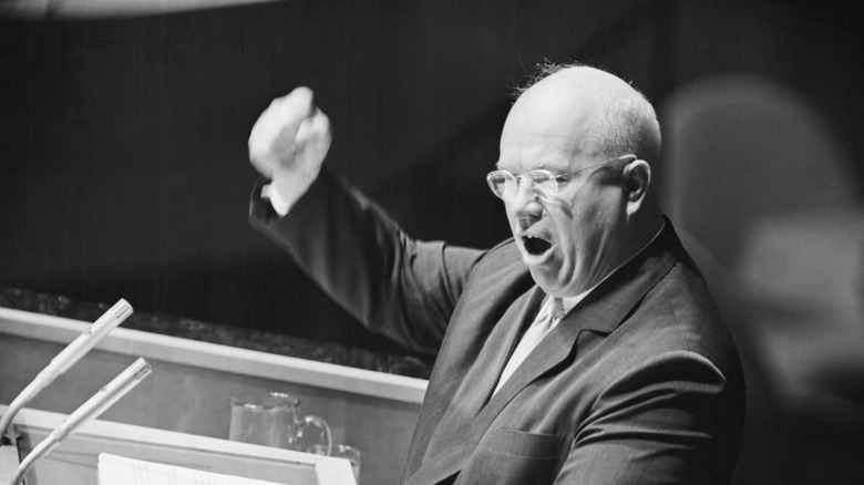 Nikita Khrushchev holding up fist